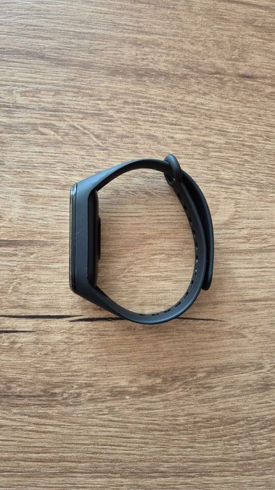 Mi band 4 używany z kablem do ładowania i nieoryginalnym paskiem