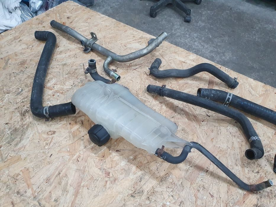 Magistrala króciec zbiorniczek wąż wodny Nissan Micra k12 1.2 04r