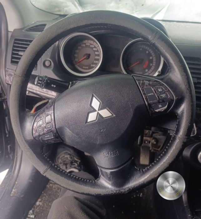 Руль б/у для Mitsubishi Lancer 10