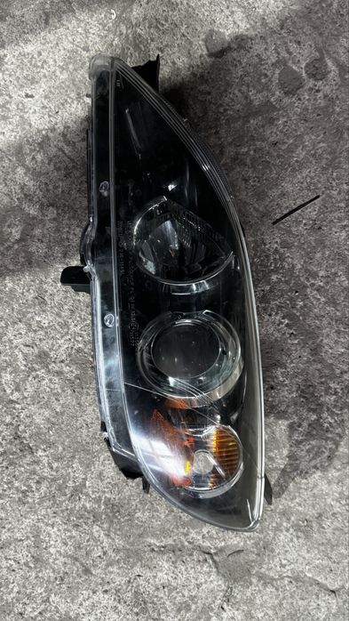 Фара Мазда 3 левая