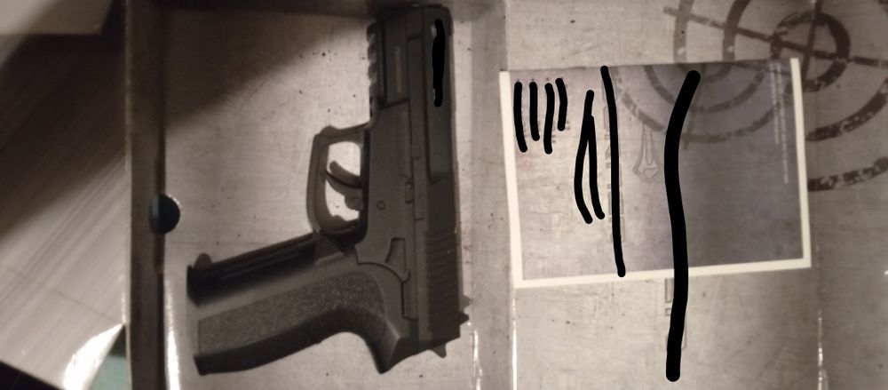 Игрушечный пистолет на пульках :)