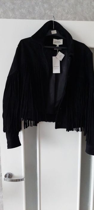 Продам  нову  жіночу  куртк    з натуральної  замшіу
Нова  нануральна