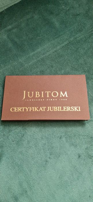 Złoty pierścionek z diamentem