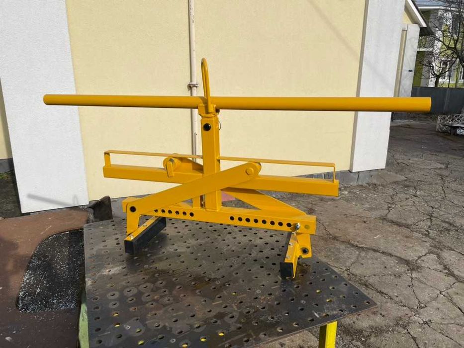 Захват для прикромкових дорожніх лотків