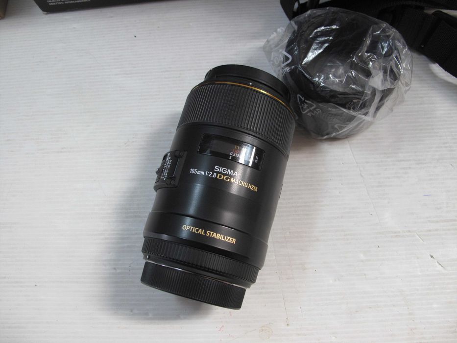 sigma 105mm 2.8 Macro para canon quanse sem uso na caixa