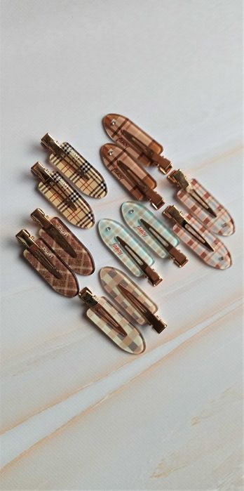 Трендові заколки для волосся клік клак та резинки для волосся