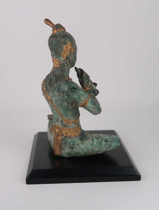 Buda sentado com flauta em bronze
