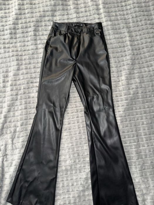Шкіряні штани клеш на високій посадці