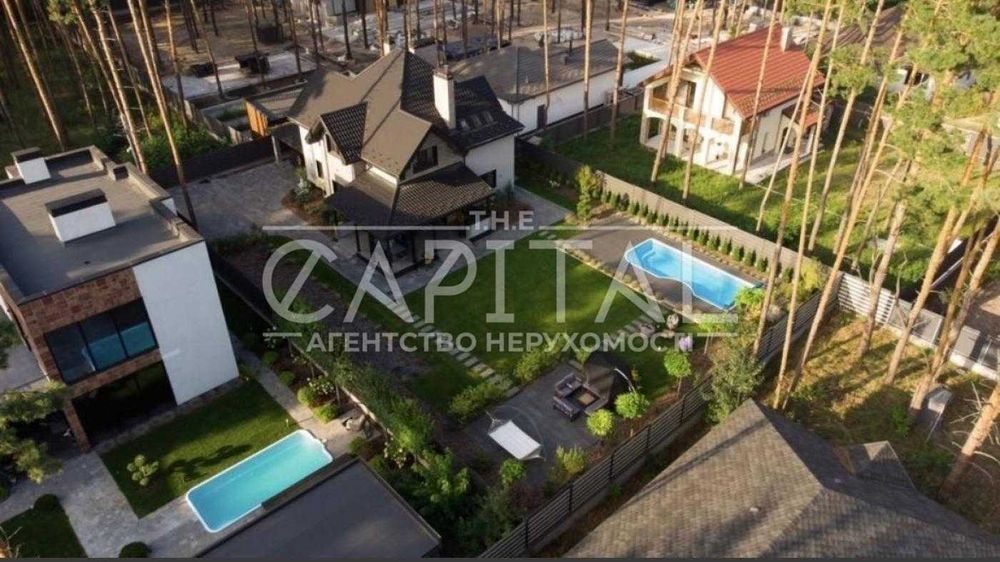 Авторський будинок із басейном та каміном у котеджному містечку з охороною