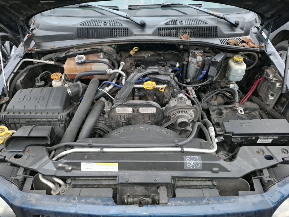 Jeep Liberty KJ   стук в двигуні