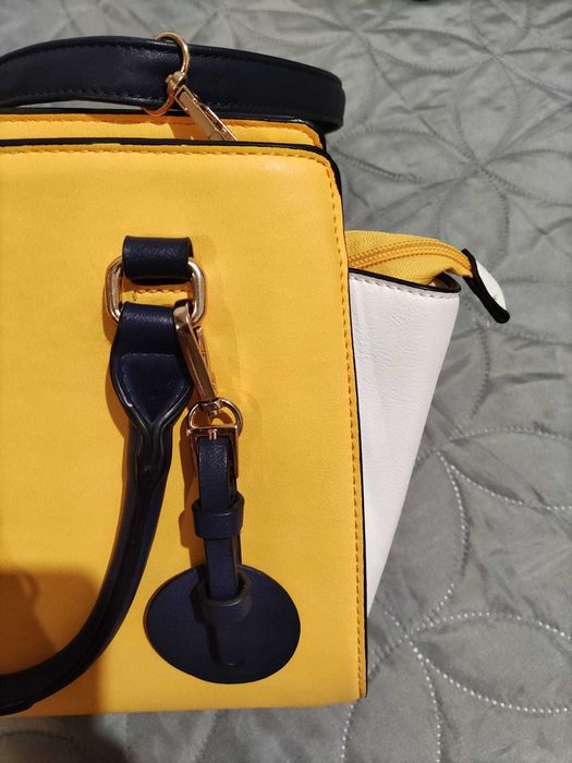 Mala amarela azul e branco