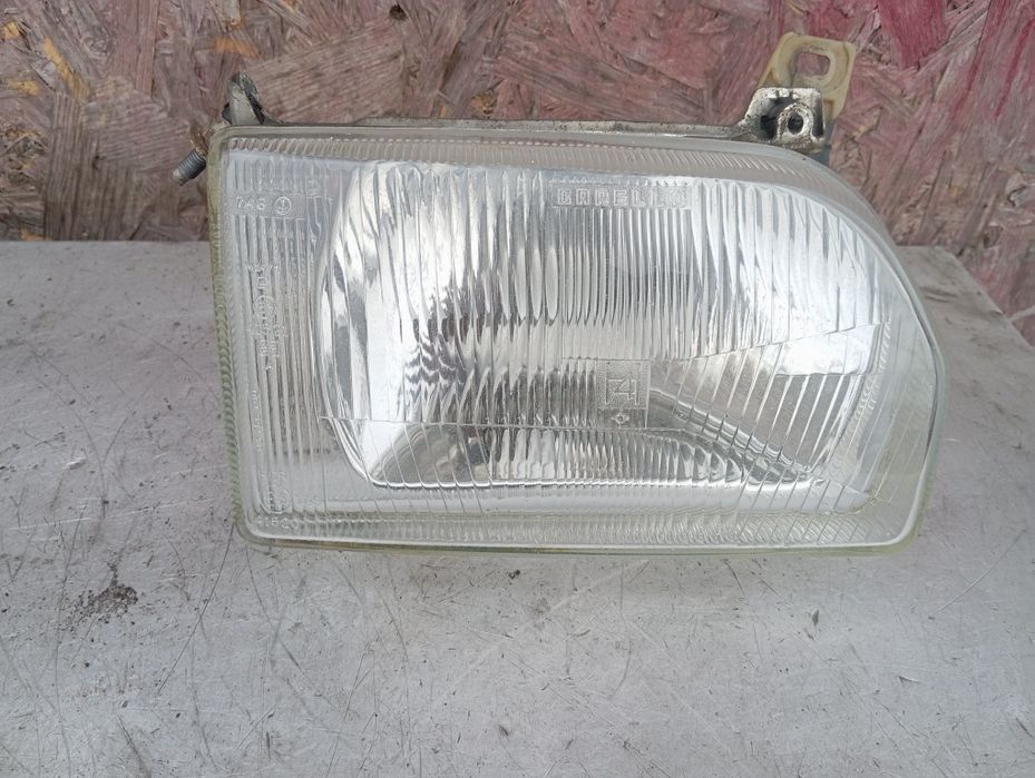 Фара Ford Escort MK4 Orion / Форд Ескорт МК4 Оріон