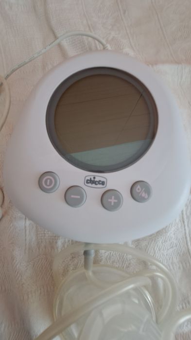 Extrador de leite e aquecedor de biberões