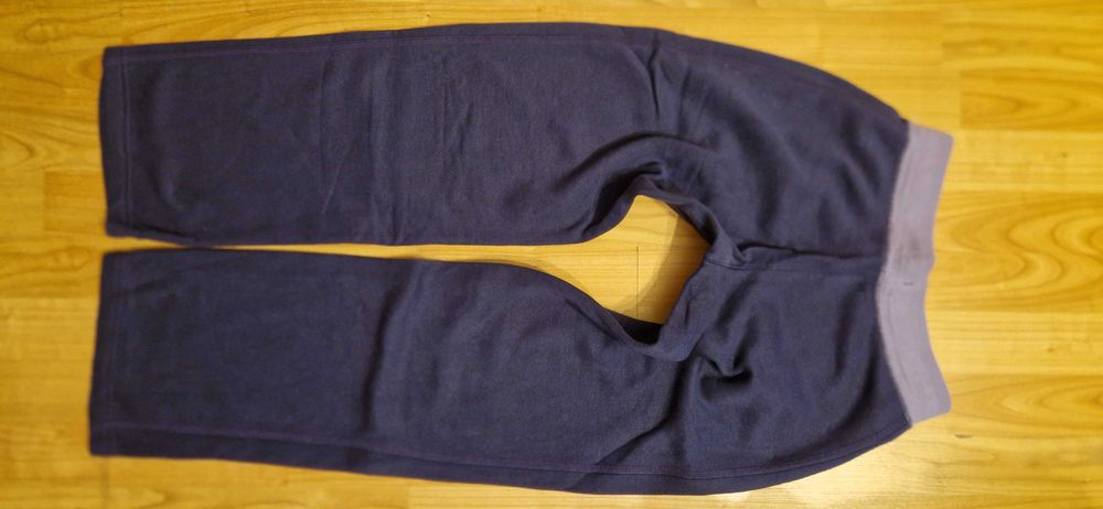 Ciepłe fioletowe spodnie dresowe Nike 152/158