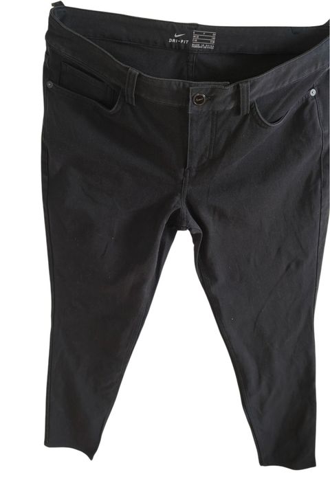 Markowe elastyczne spodnie jeans firmy Nike r 38 M czarne