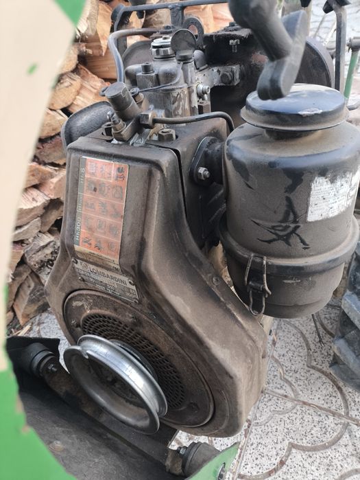 Motocultivador Ferrari com alfaias e atrelado