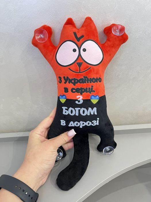 Котик іграшка на присосках