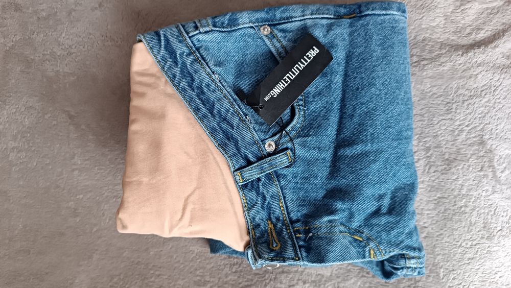 Джинси для вагітних