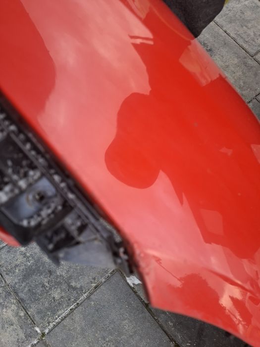 Toyota Corolla e12 hatchback 02-07 blotnik przedni lewy czerwony 3p0