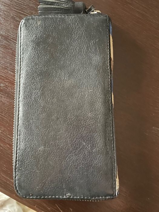 Carteira em pele em bom estado
