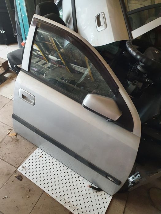 Двері   опель   астра   ж