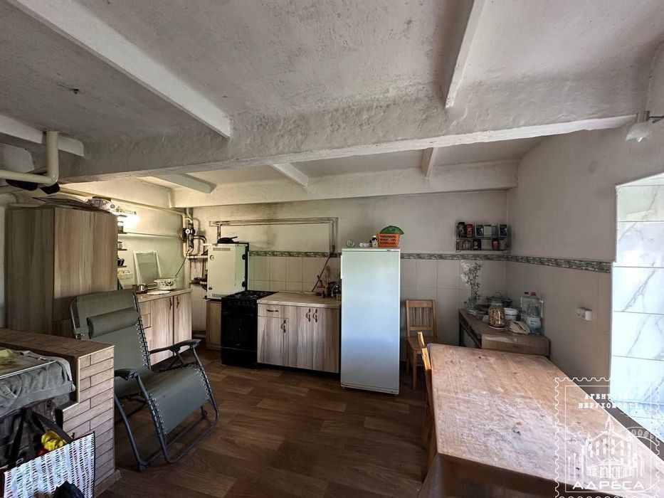 Продаж будинку з земельною ділянкою