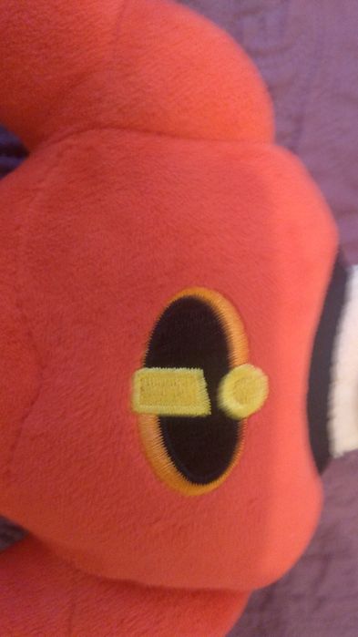 Megamocny Tata, pluszak maskotka.