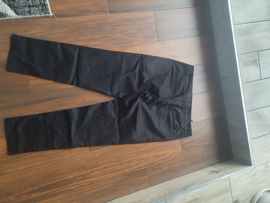 Sprzedam nowe bardzo eleganckie spodnie Top Secret 38
