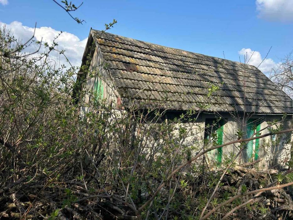 Продається пів будинку в м.Городок.