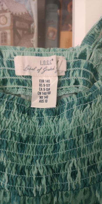 Kombinezon letni r. 140 H&M