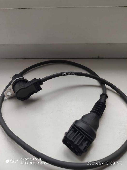 Импульсный датчик коленчатого вала 12141703277 (новый оригинал) М52