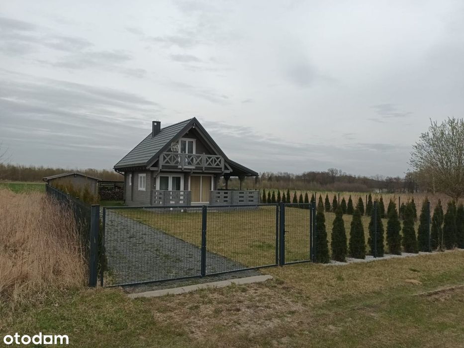 Dom całoroczny z działką nad jeziorem