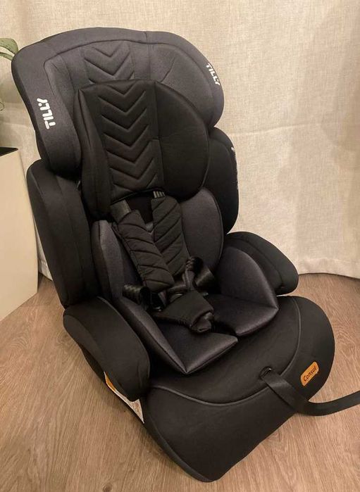 Дитяче  автокрісло бустер до 12 років універсальне 9-36 кг tilly