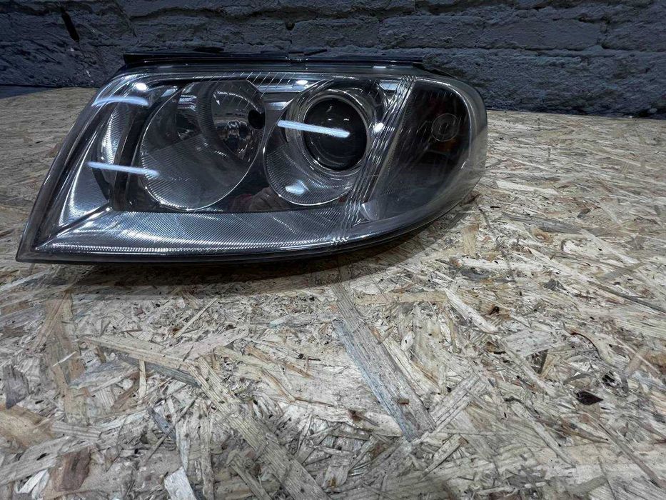 Lampa reflektor lewy vw passat b5 lift