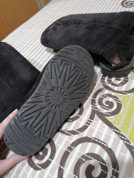 Botas de cano alto castanhas