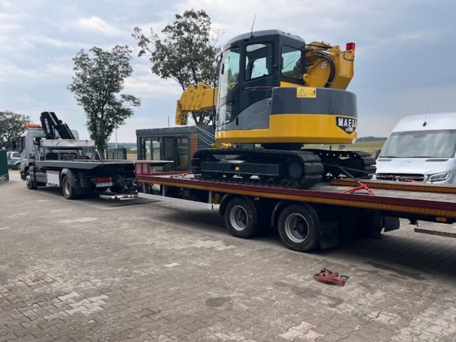 Usługi transportowe HDS z przyczepą niskopodwoziową dzwig