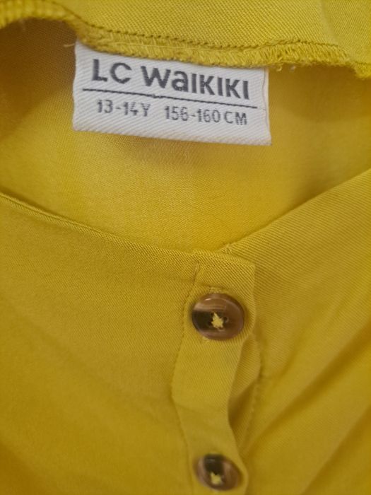 Комбінезон укорочений на дівчинку.