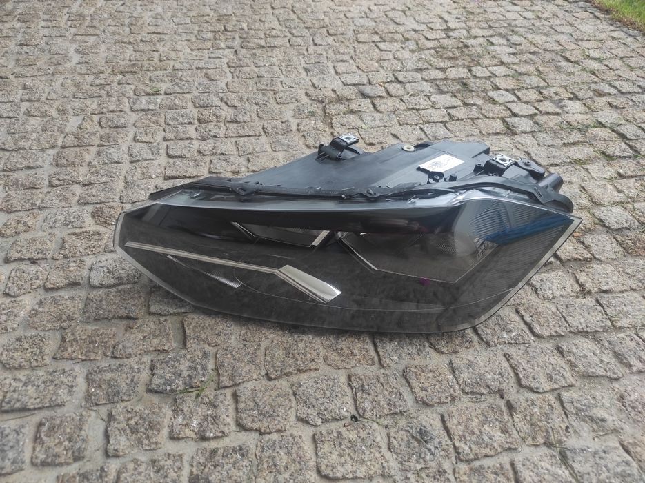 Farol esquerdo Volkswagen Polo IV