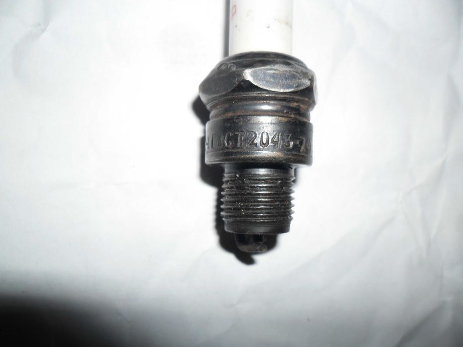 Свеча зажигания и кольцо на поршень, СССР ,к двигателю Ш -58.