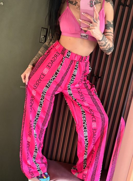 Spodnie Versace luźne wysoki stan cienkie