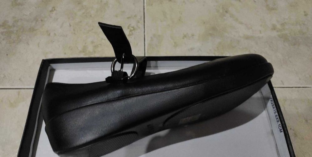 Sapatos pretos como novos
