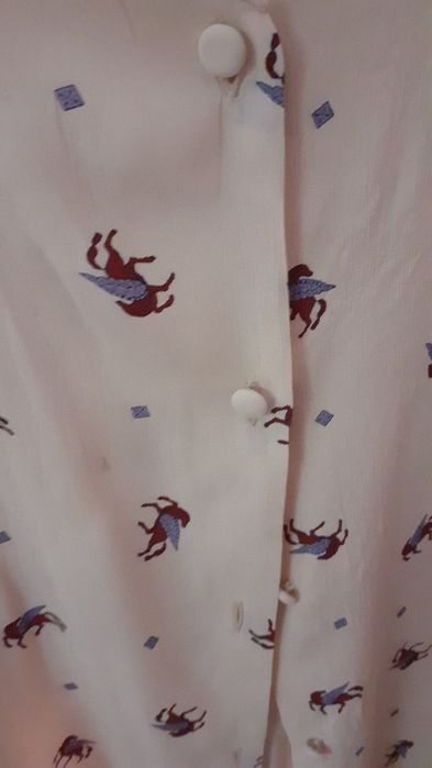 2 € Blusa XL de manga curta, botões forrados, tecido fresco