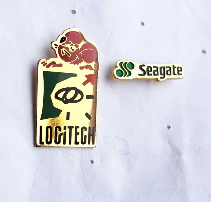 zestaw przypinek Logitech Seagate historyczne loga