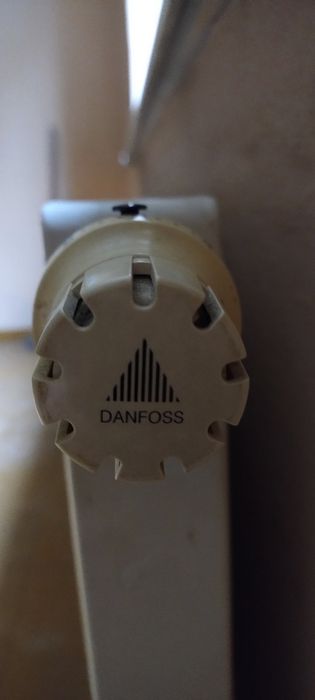 Grzejniki Burgman + Danfoss głowice termostatyczne