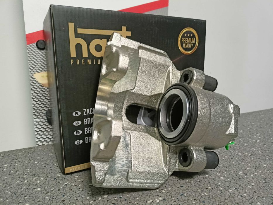 Audi A4,A6,Superb,Passat B5 Zacisk hamulcowy przód lewy PREMIUM.>