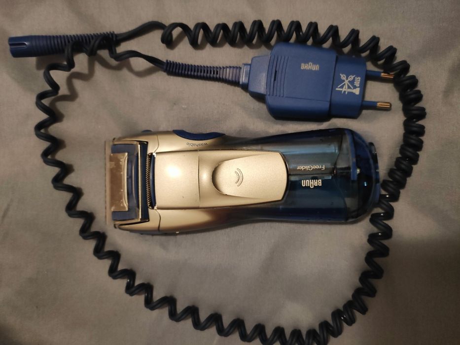 Máquina de barbear Braun FreeGlide
Tampa de proteção de rede 
Rede