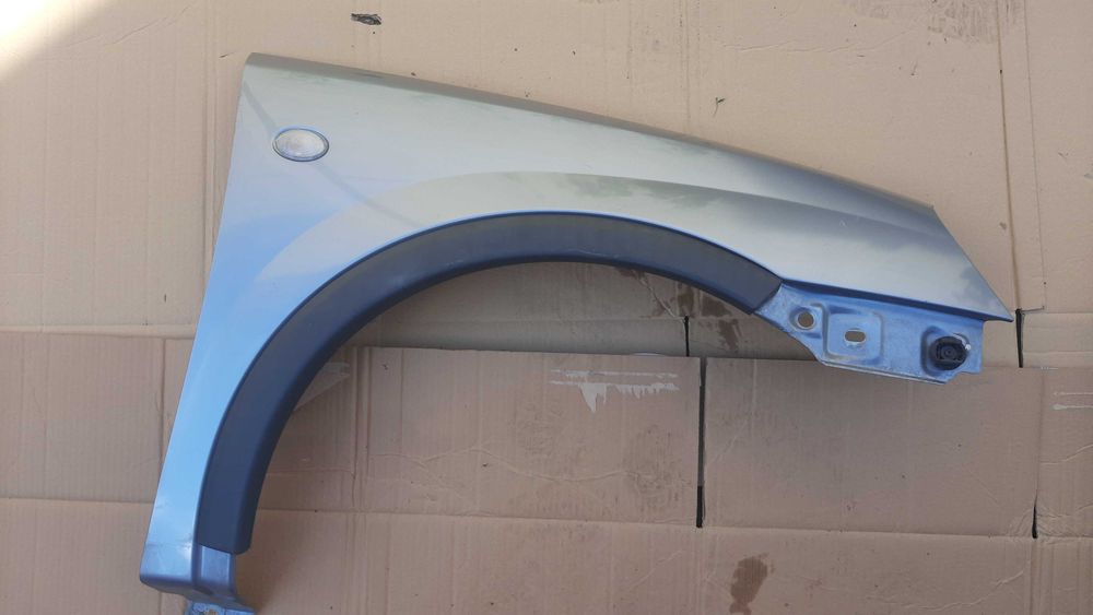 lak. Z163 Opel Corsa C Combo błotnik prawy przedni do montażu