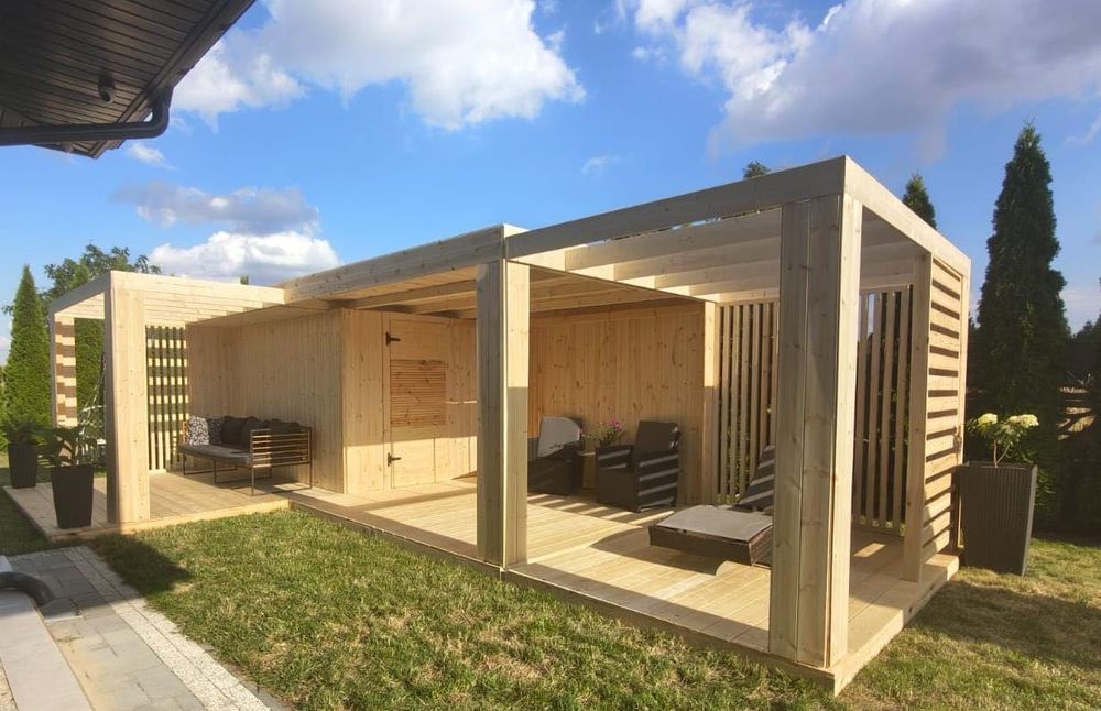 Domek ogrodowy a altaną i pergolami