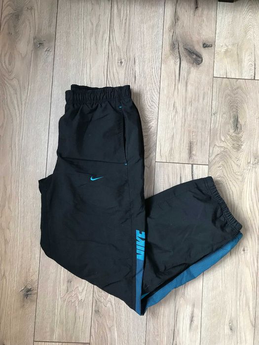 Spodnie dresowe z szerokimi nogawkami Nike rozm. S