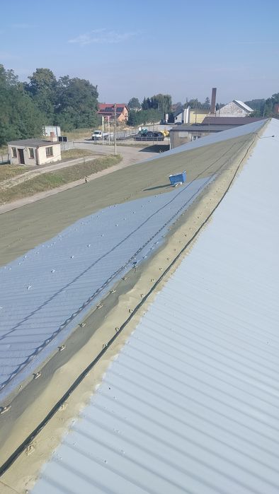 Mycie i malowanie dachów oraz elewacji .